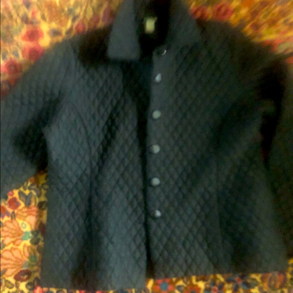 Silk 100% cropped fit jacket w fabric covered buttons. Stylish and classic.